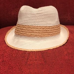 White and tan fedora hat